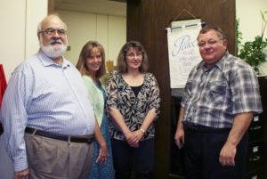 Anne Marie Amacher Members of the Office of Faith Formation are, from left, Don Boucher, Barbara Butterworth, Marianne Agnoli and John Valenti. 