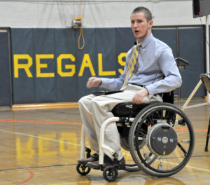 Lindsay Steele Chris Norton speaks to students at Regina Junior/Senior High School about perseverance and standing strong in the face of adversity Oct. 16.