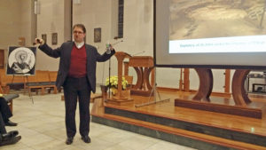 Barb Arland-Fye Czech theologian Father David Voprada speaks about the legacy of Saint Ambrose of Milan at Christ the King Chapel on the St. Ambrose University campus in Davenport Dec. 6 in honor of the Feast of St. Ambrose. 