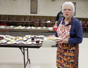 Barb Arland-Fye Sister Donna Donovan, CHM, helps serve a Thanksgiving meal at the Ottumwa Community Thanksgiving Dinner Nov. 26. The meal was served at the Knights of Columbus Hall in Ottumwa.