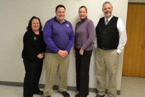 Shelley Rublaitus Celeste Vincent, Ben Nietzel, Bridget Murphy and Bill Maupin pose for a picture during a Diocese of Davenport Catholic schools principals meeting Jan. 19 at Regina Catholic Education Center in Iowa City. The four principals, along with Nancy Peart (not pictured), once attended the schools they now administer.   