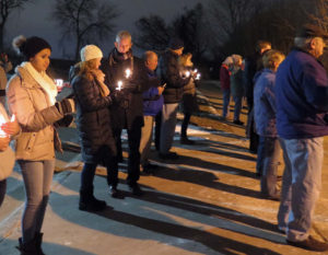 Andrew Amacher Pro-life supports prayed silently on the sidewalk of Planned Parenthood in Bettendorf Jan. 22 to mark the anniversary of Roe v Wade. A rosary and program were held beforehand at the Women’s Choice Center across the street. 
