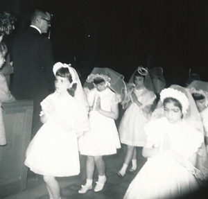 Contributed Barb Arland-Fye, front left, leaving church after making her first Communion with her class in May 1966.