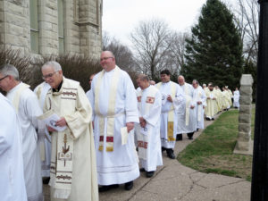 Anne Marie Amacher Priests line up before the Chrism Mass last month at Sacred Heart Cathedral in Davenport. Father Thom Hennen talks about the application process to becoming a seminarian.