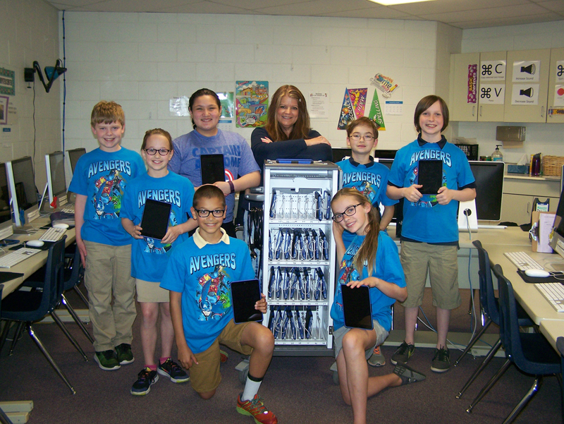 Shelley Rublaitus Members of Regina Elementary-Iowa City’s App Avengers pose for a picture May 16 in the school computer lab. In the front row: Peter Knepper and Bella Schuessler. In the back row: Thomas Shey, Cate Klitgaard, App Avengers Captain Lily Santillan, club adviser Diann Zirtzman, Peter Burer and Aden Hageman. 