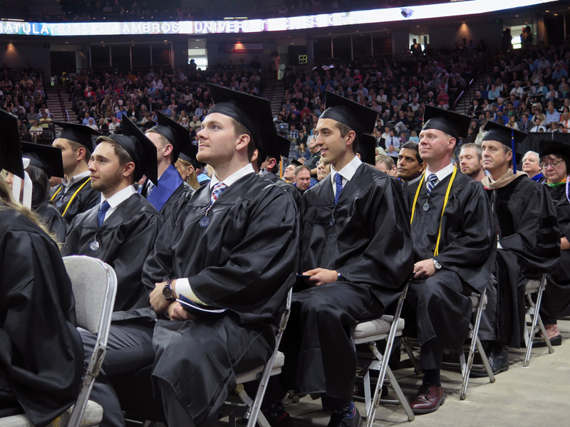 Anne Marie Amacher Members of the St. Ambrose University class of 2016 listen to a commencement speech by Jim Collins at the St. Ambrose University commencement ceremony May 14 at the iWireless Center in Moline, Ill. 