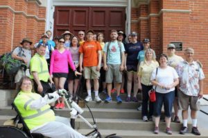 Barb Arland-Fye Pilgrims gather in front of St. Mary Church in Iowa City before starting a 22-mile pilgrimage from Iowa City to Nichols.