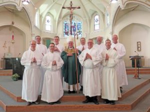 Anne Marie Amacher Deacon Formation Class VII was installed to the ministry of acolyte June 11 at St. Paul the Apostle Church in Davenport. Deacon candidates with Bishop Martin Amos are, front, from left, Mike Snyder, Chris Kabat, Lowell Van Wyk, Joseph Welter; back, Dan Freeman, Steve Barton, Bishop Amos, Tom Hardie, John Jacobsen and Joe Rohret.