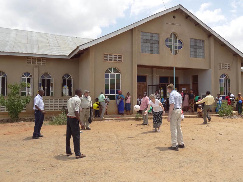 Tammy Kampfe Supporters of Mater Dei USA play a game of Ultimate Foursquare with parishioners at Makaynia Parish in Tanzania, Africa, in this 2014 photo. Mater Dei USA works with Mater Dei Africa to break the cycle of poverty.