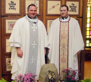 Contributed Father Jake Greiner, left, poses with Father Kevin Anstey.