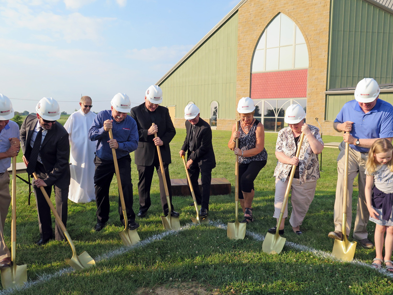 Anne Marie Amacher Bishop Martin Amos, Father Ken Kuntz and others break ground for a new $2.34 million parish hall at Jesus Christ, Prince of Peace Parish in Clinton Aug. 9. 