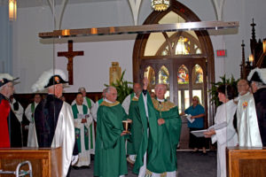 Barb Arland-Fye Bishop Martin Amos blesses the new gathering space July 31 at Ss. Mary & Joseph Church of Holy Family Parish-Fort Madison as part of 175 years of Catholicism in the city.