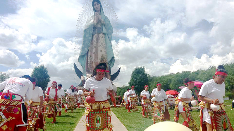 Sergio Guerrero-Ibarra A group of dancers from St. Joseph Parish in West Liberty danced in front of the world’s tallest Our Lady of Guadalupe statue in Windsor, Ohio in August. The dance group performs in West Liberty and Columbus Junction every December for the Our Lady of Guadalupe celebrations.  