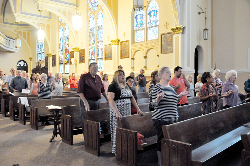 Lindsay Steele Catholics sing worship songs during a Year of Mercy mission at Ss. Mary & Mathias Catholic Church Sept. 14. 