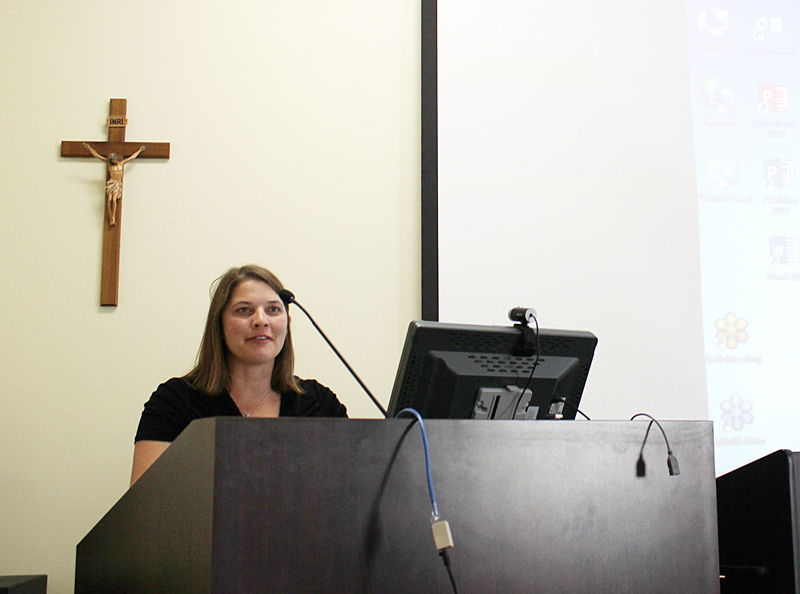 Barb Arland-Fye Nikki Gartner, CFO for the Diocese of Davenport, speaks about new labor laws at the Parish Corporate Board Meeting earlier this week. 