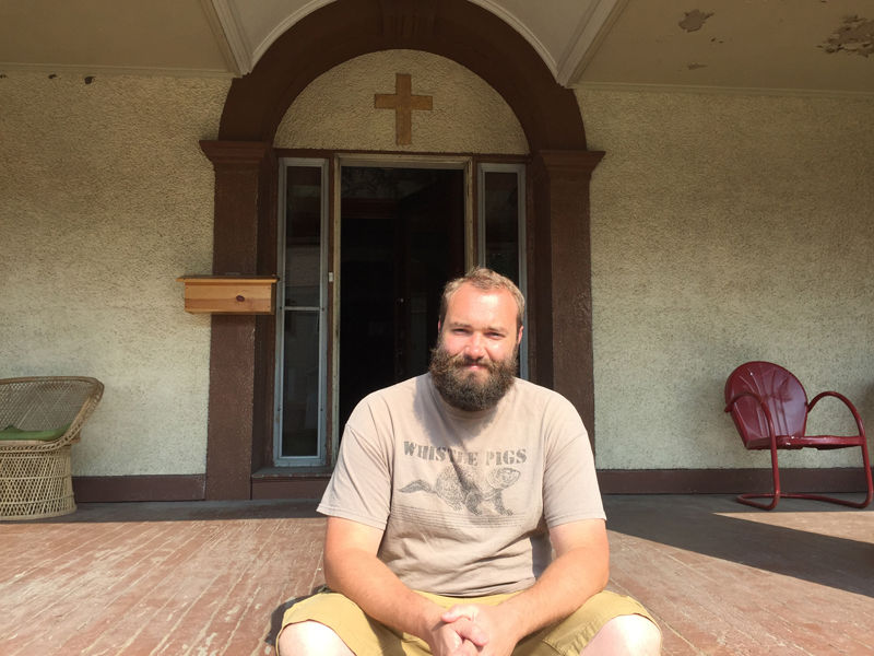 Barb Arland-Fye Shane Weimer sits outside One Eighty, a Christian organization that helps addicts and others, in Davenport.
