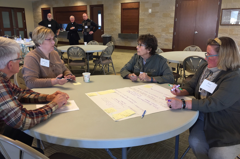 Barb Arland-Fye Some members of the Diocesan Pastoral Council participate in a strategic planning exercise on Nov. 12 at St. Patrick Parish in Iowa City. Pictured from left are Gary Low, Kathryn Davis, Roseanne Wisor and Patti McTaggart. 