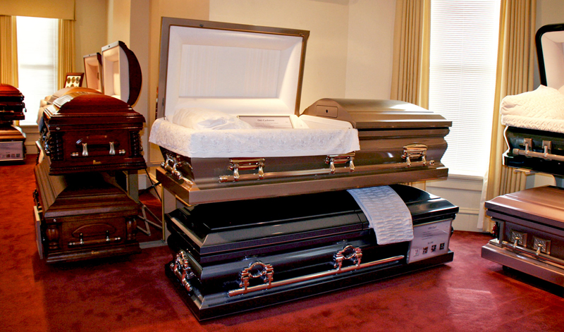Anne Marie Amacher Caskets can come in wooden or metal versions as shown above at Halligan-McCabe-DeVries Funeral Home in Davenport. 