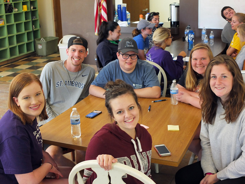 Contributed Freshmen Kaitlin Coulter, Bri Kelly and Claire McCarthy, along with sophomore Jacob Hayles, a peer campus minister; and freshmen Dawson Laubenstein and Britney Neyen are shown at a new student retreat earlier this school year.  