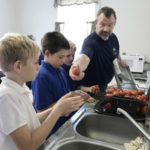 Holy Trinity-West Point sixth-graders prepare meal for families in need
