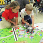 Learning to solve problems through Lego competition