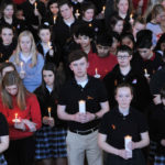 Students prayerfully reflect on Florida school shooting