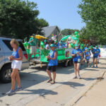 Parade tradition carries on after merger