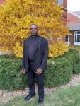 From Tanzania to St. Ambrose - Fr. Denis embraces academic and life experiences