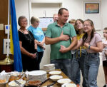 Ukrainian family welcomed as new residents of Muscatine